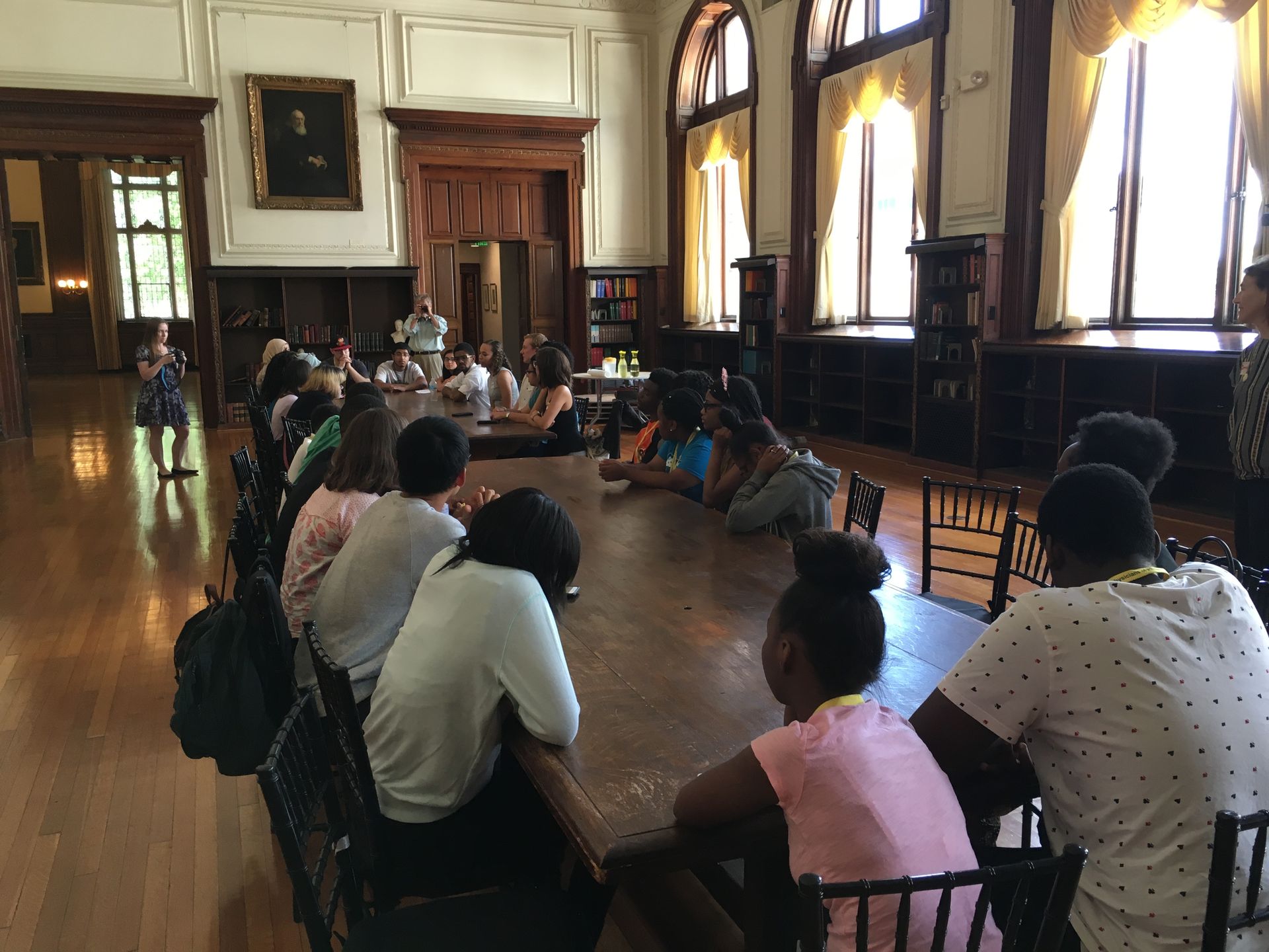 The Karabots Junior Fellows and Penn's SUMR Scholars network around a table at the College of Physicians of Philadelphia