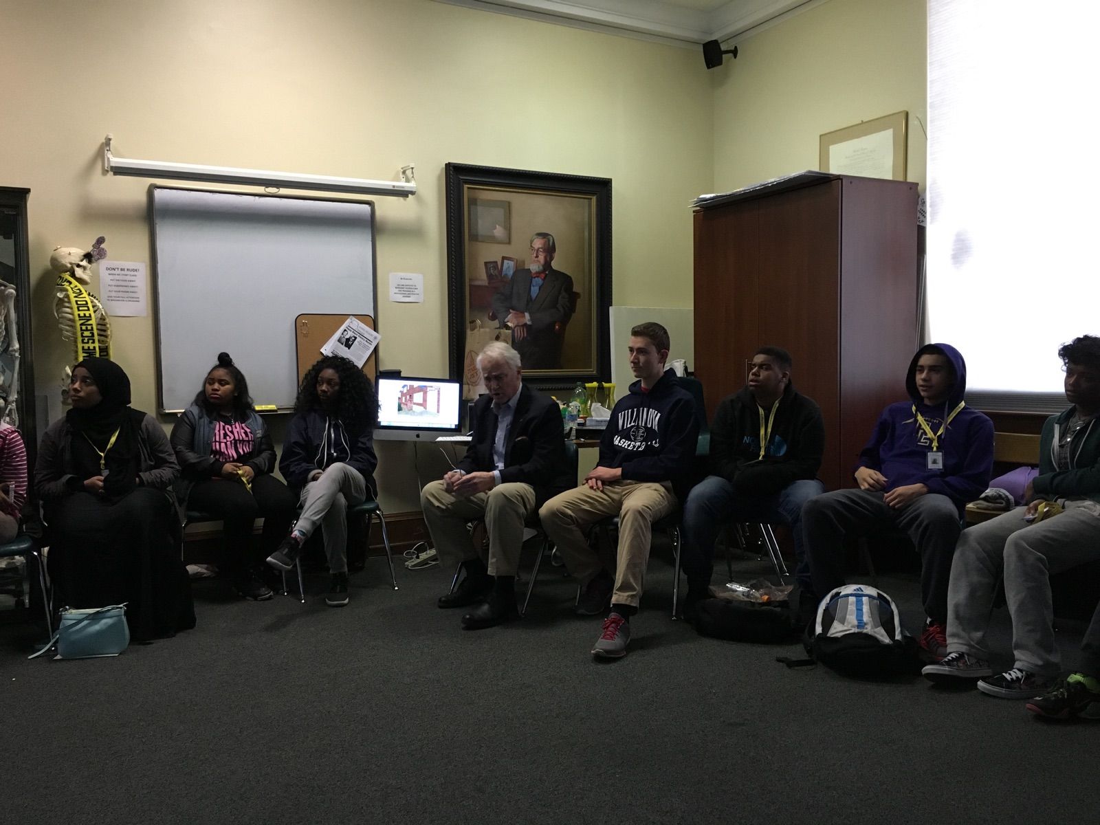 The Karabots Junior Fellows meet with forensic expert Allen Burgess who leads them through the game Virtual Forensics Lab