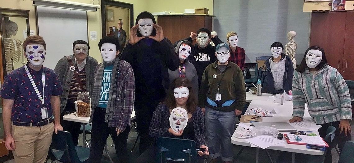 Students in the Out4STEM Internship Program pose wearing homemade masks
