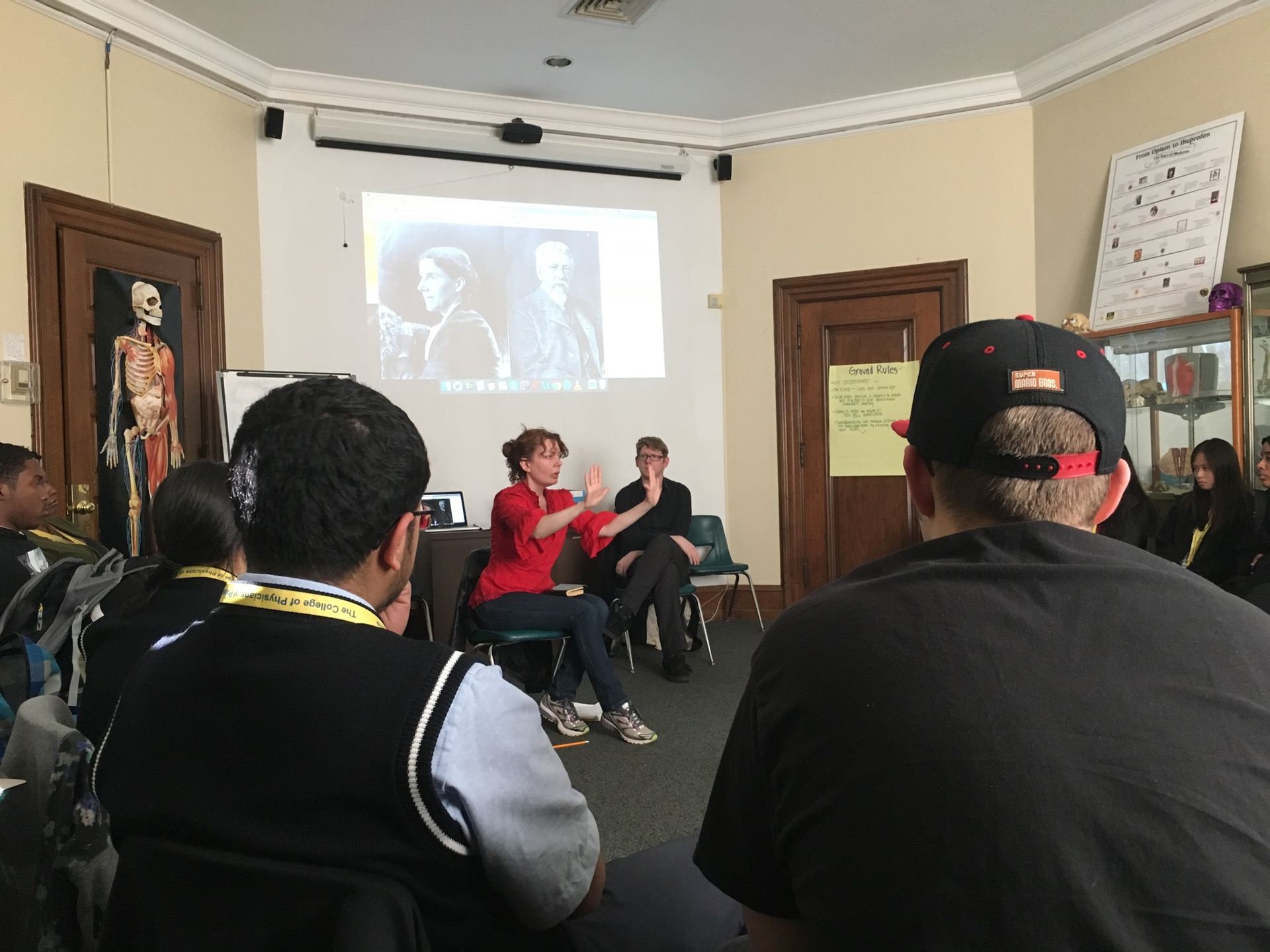 Actress Jennifer Sumemrfield portrays a scene from her one-person show of The Yellow Wallpaper, directed by Josh Hitchens (seated right)