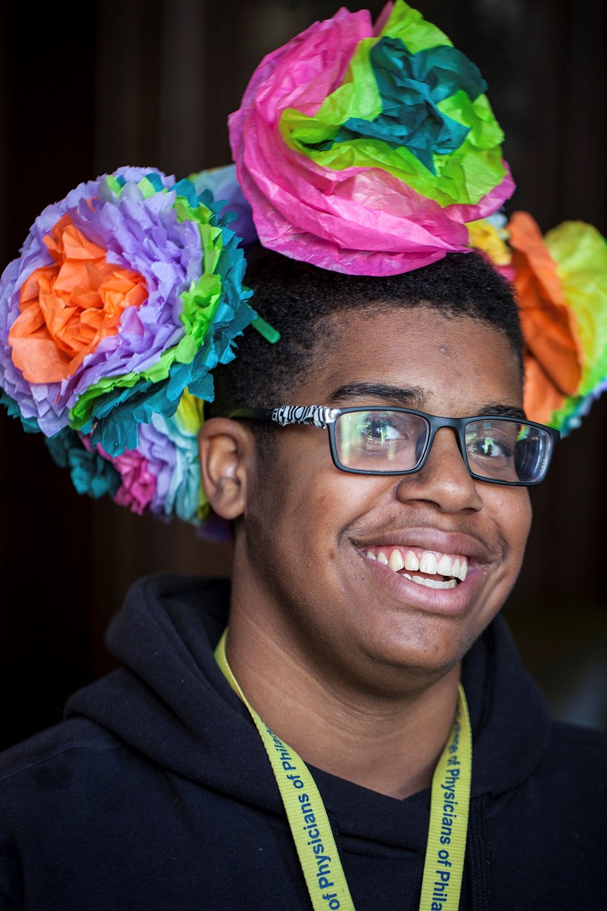 KJF4 Fellow Victor showing off his homemade paper flowers at at the Mutter Museum Day of the Dead event, 10/31/15