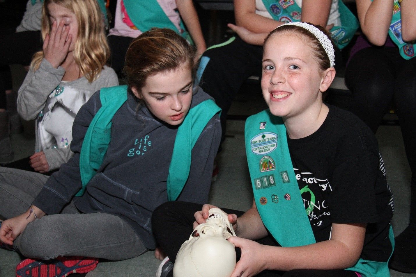 A Troop of Girl Scouts learn about forensic anthropology during our "Bone Detectives" activity