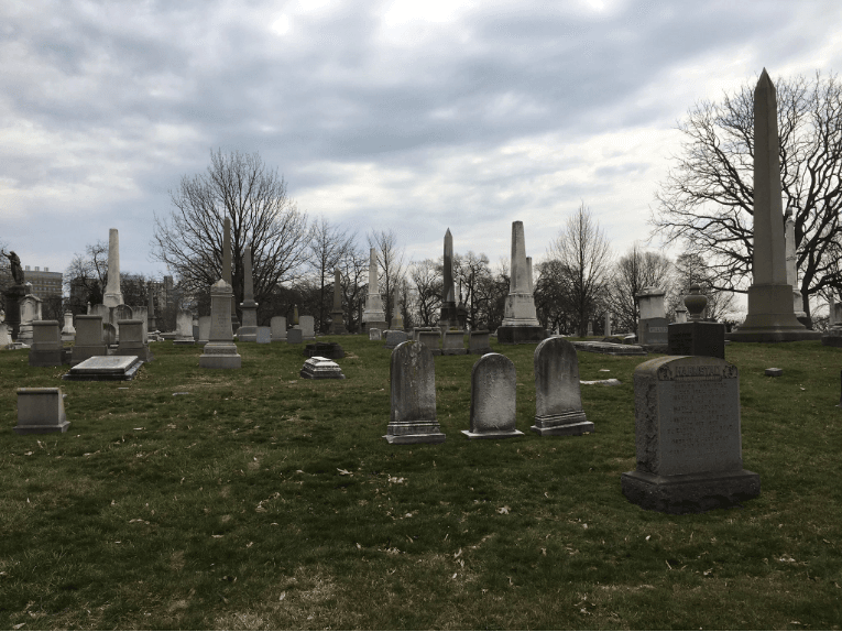 Various headstones, grave markers, and obelisks at the Woodlands Cemetery