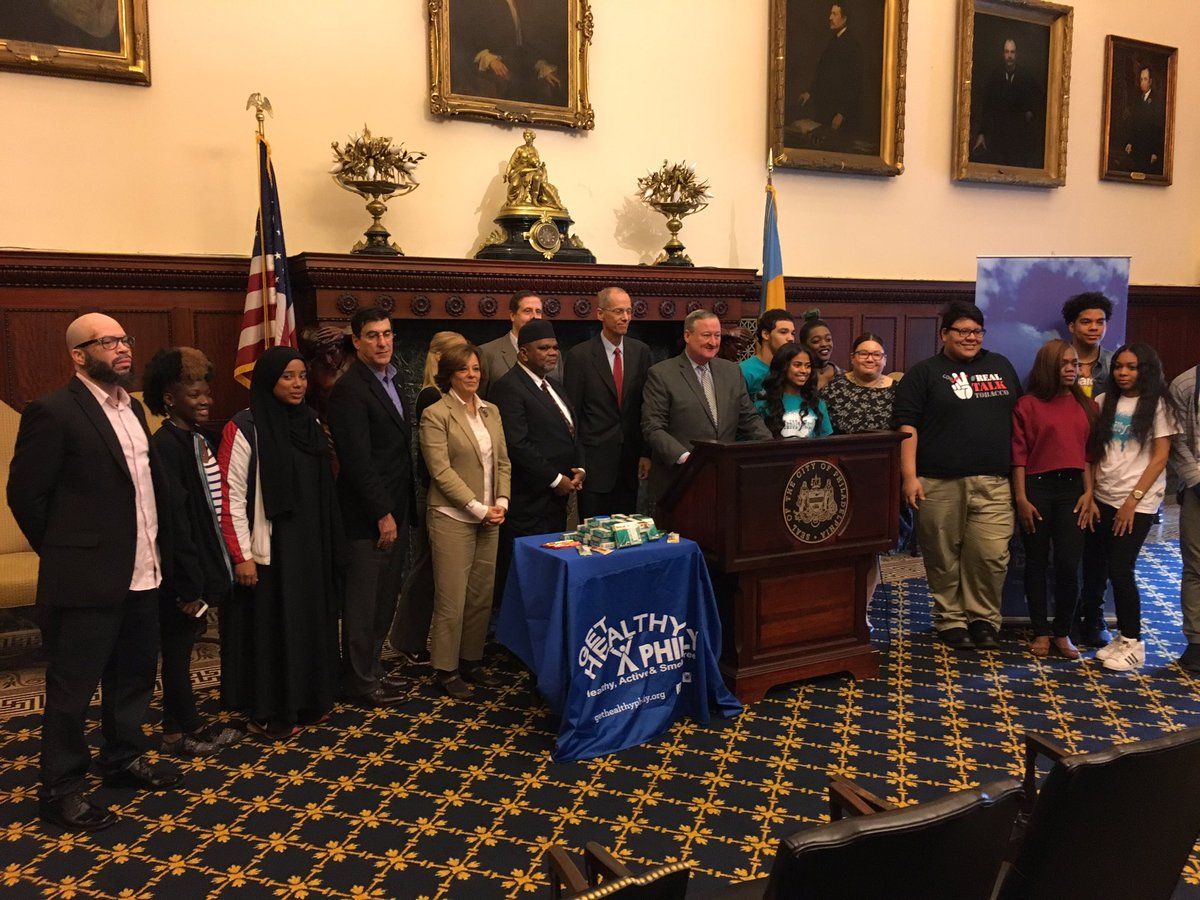 Students from the KArabots Junior Fellows Program pose with Philadelphia Mayor Jim Kenney, public health officials, and other youth at an October 12, 2016, press conference on increased tobacco regulation