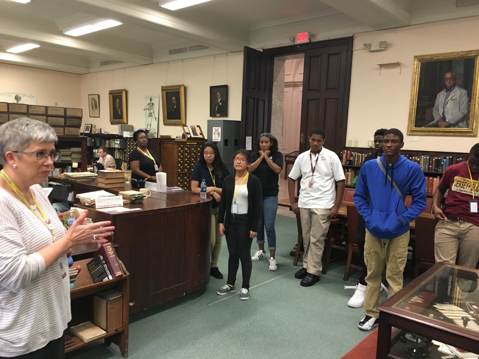 Students in the Karabots Junior Fellows Program meet with College Librarian Beth Lander during a tour of the Historical Medical Library